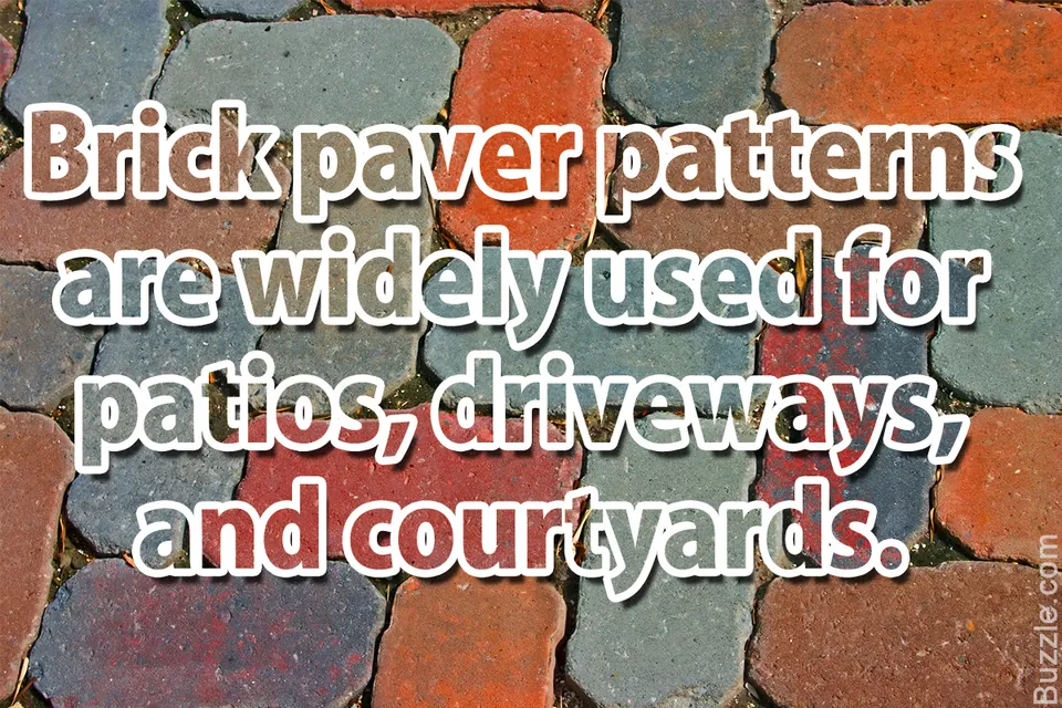 Red, grey, and blue interlocking brick pavers are arranged in a random pattern.
