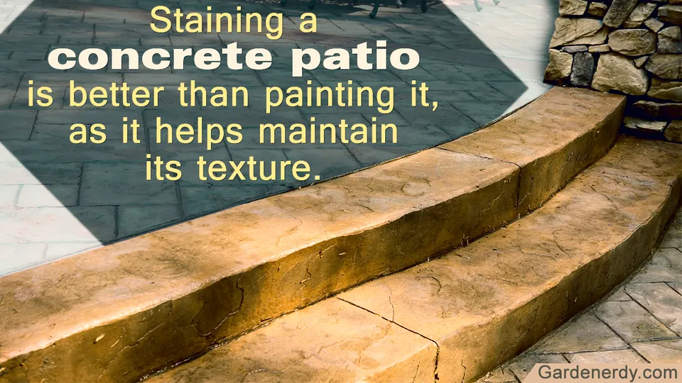 Curved concrete steps stained golden brown lead up to a dark patterned patio area next to a stone wall.