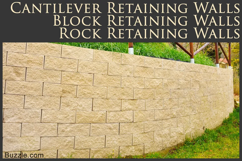 A tan block retaining wall with green grass growing behind and in front of it.