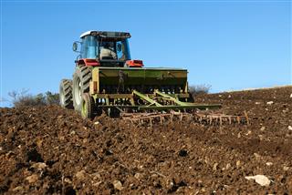 Agricultural Tractor Sowing Seeds
